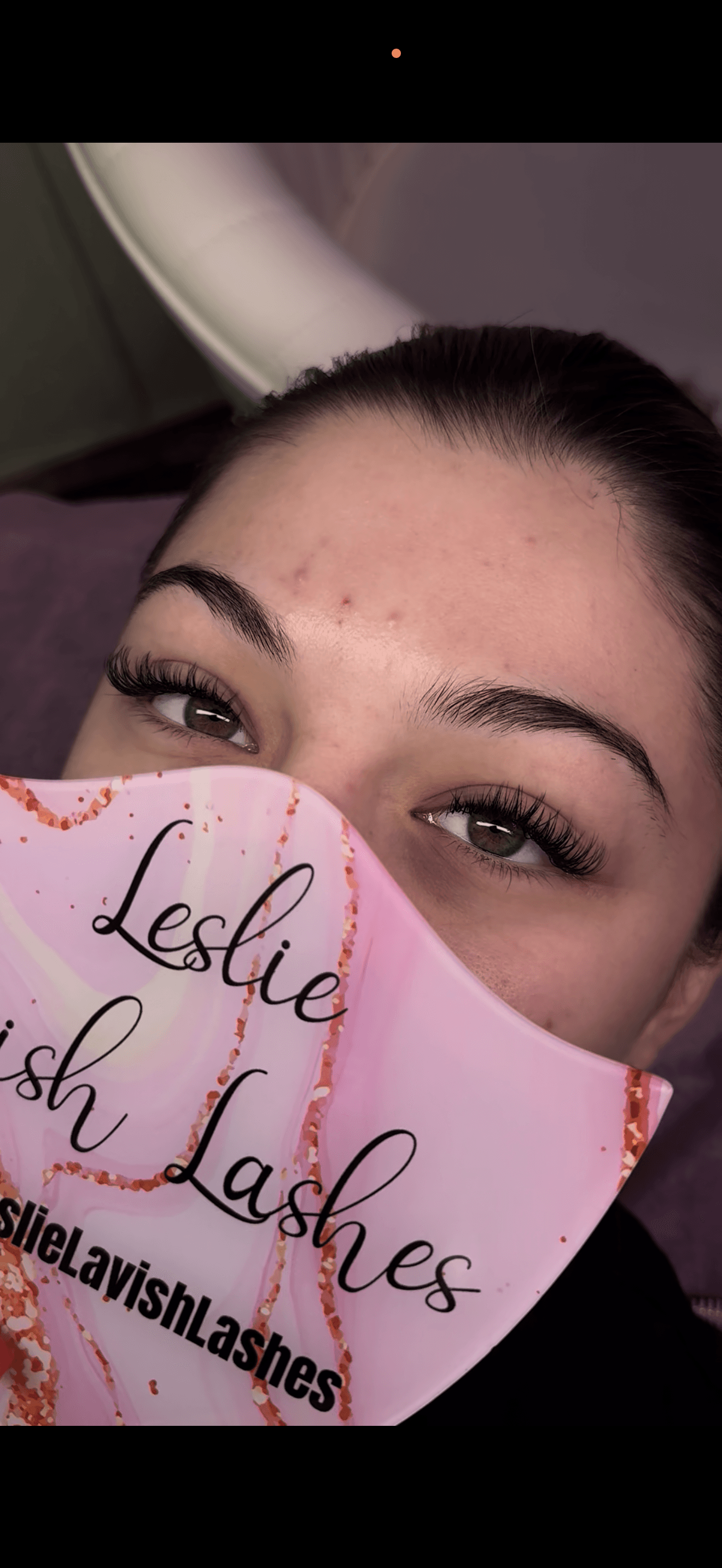 Close-up of a natural classic lash extension set
